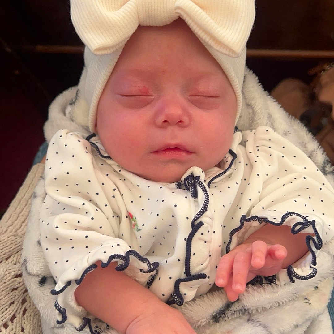 Nataly is registered to the contest to win money with this photo: accessories, architecture, baby, bed, blanket, bonnet, building, clothing, face, furniture, glove, hat, head, hospital, newborn, person, photography, portrait, quilt, sleeping