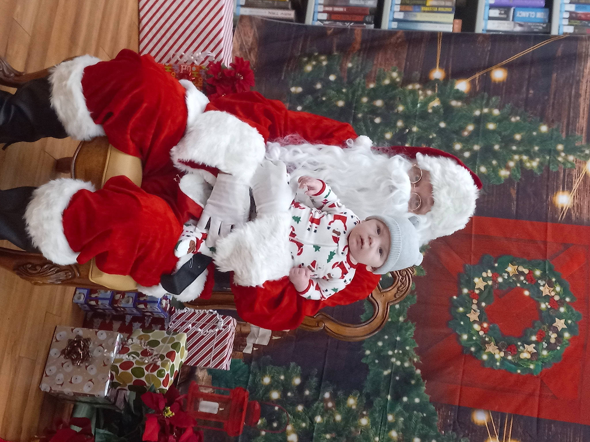 Blaine joined the competition — help win amazing prizes! carmine, christmas, christmas_decoration, christmas_elf, christmas_eve, christmas_ornament, christmas_tree, decoration, event, hat, headwear, holiday, holiday_ornament, interior_design, lap, ornament, person, plant, red, santa_claus