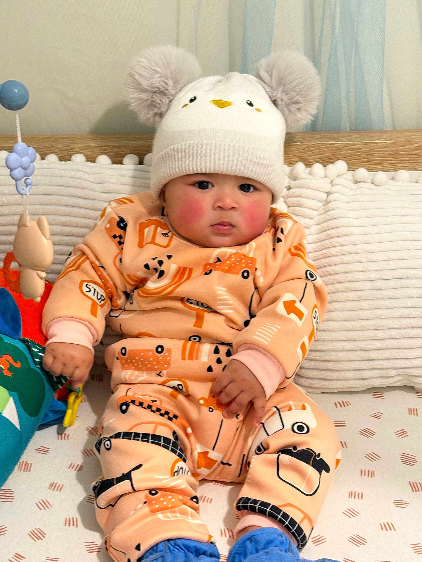 Addvik joined the competition — help win amazing prizes! baby, child, infant, hat, pom_poms, plush, toy, sitting, cozy, outfit, patterned_clothing, cheeks, rosy_cheeks, indoor, bed, blanket, cute, warm, person, portrait