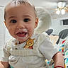 Javier joined the competition — help win amazing prizes! baby, infant, milk_mustache, winnie_the_pooh, white_clothing, baby_seat, colorful_pattern, happy, smiling, indoor, ceiling_fan, child, person, closeup, cute, portrait, young, home, candid, playful