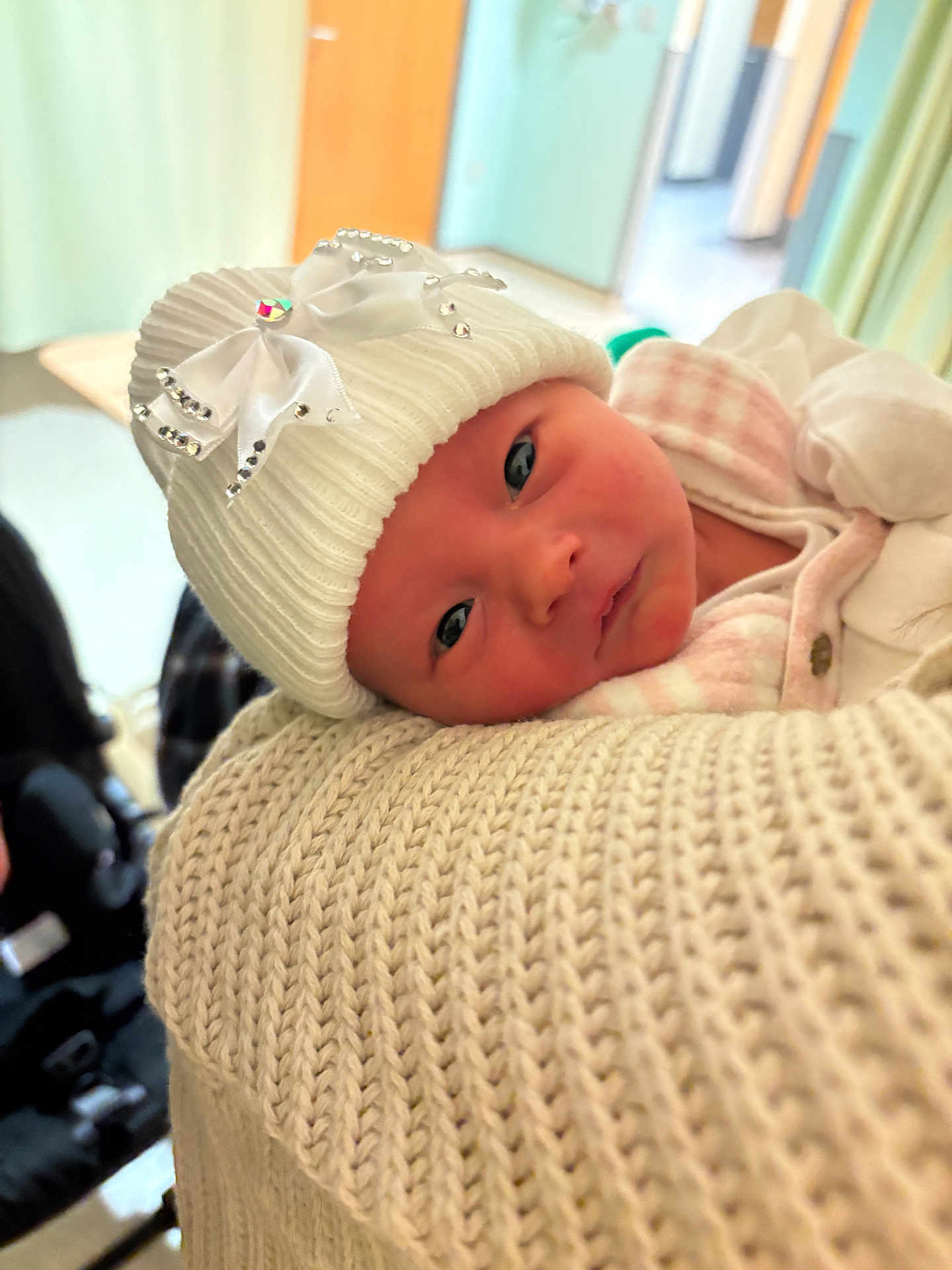 Quinzella-Bambi joined the competition — help win amazing prizes! baby, newborn, hat, white_hat, bow, knitwear, cozy, infant, face, eyes, indoor, blurred_background, person, clothing, warm, soft_light, portrait, baby_clothes, closeup, cute