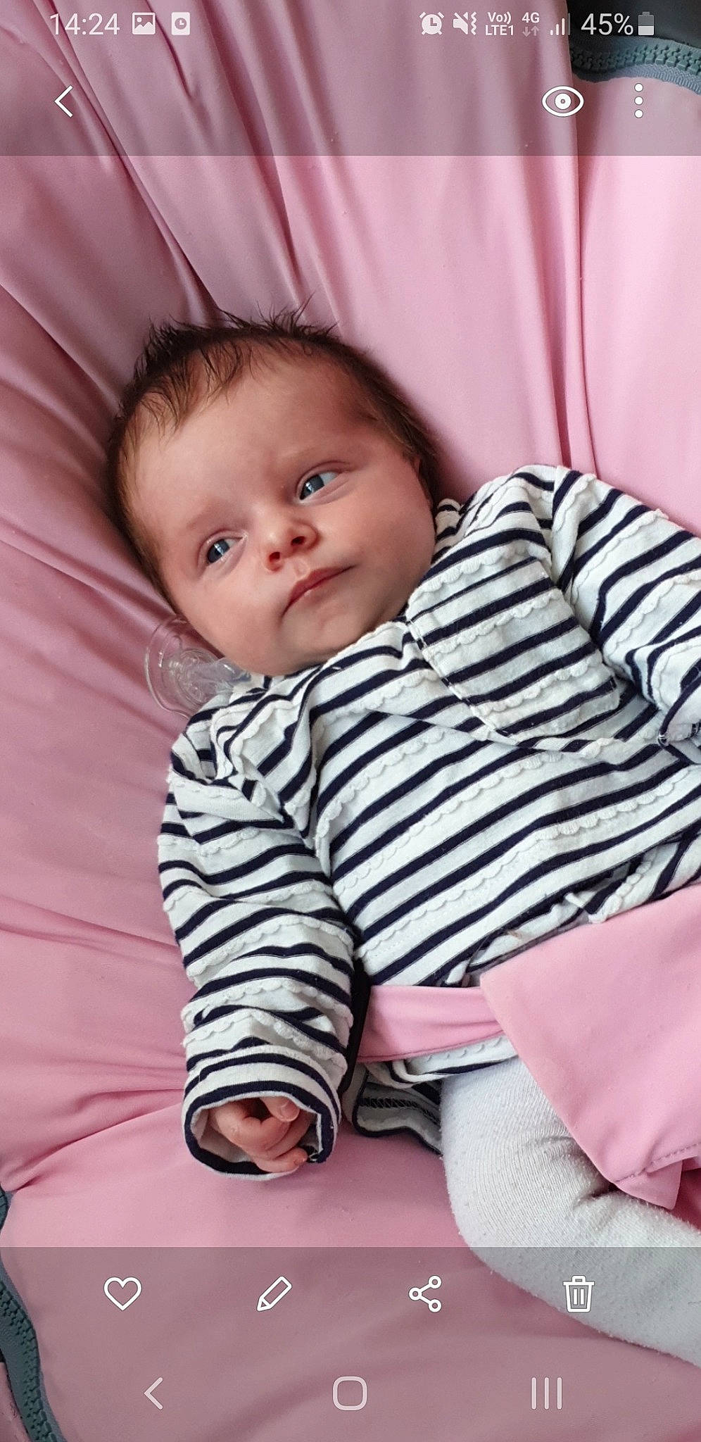 Théa participe au concours pour gagner de l'argent avec cette photo : baby, baby_toddler_clothing, cheek, child, comfort, eyebrow, iris, linens, lip, person, pink, portrait_photography, skin, toddler