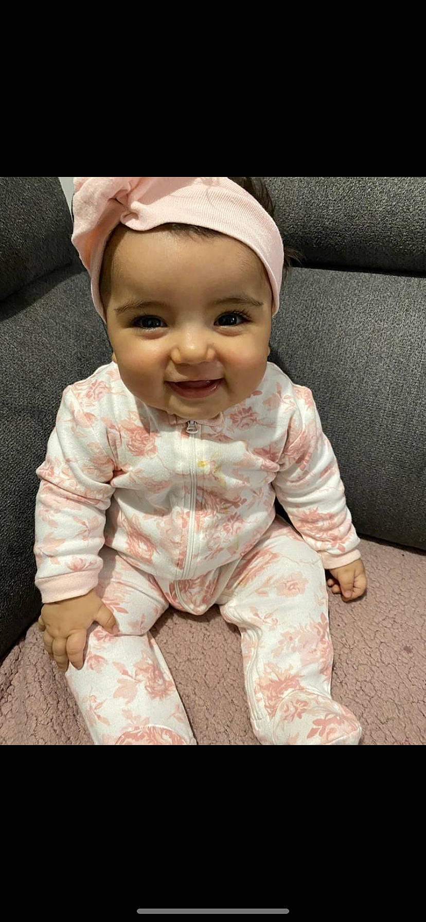 Kamila participe au concours pour gagner de l'argent avec cette photo : baby, baby_toddler_clothing, cap, cheek, child, eye, face, flooring, happy, head, headwear, joy, nose, outerwear, pattern, person, pink, skin, sleeve, smile