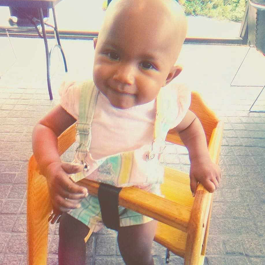 Ava joined the competition — help win amazing prizes! baby, chair, clothing, cream, dessert, diningtable, face, food, furniture, happy, head, pants, person, photography, plant, portrait, pottedplant, shorts, sitting, table