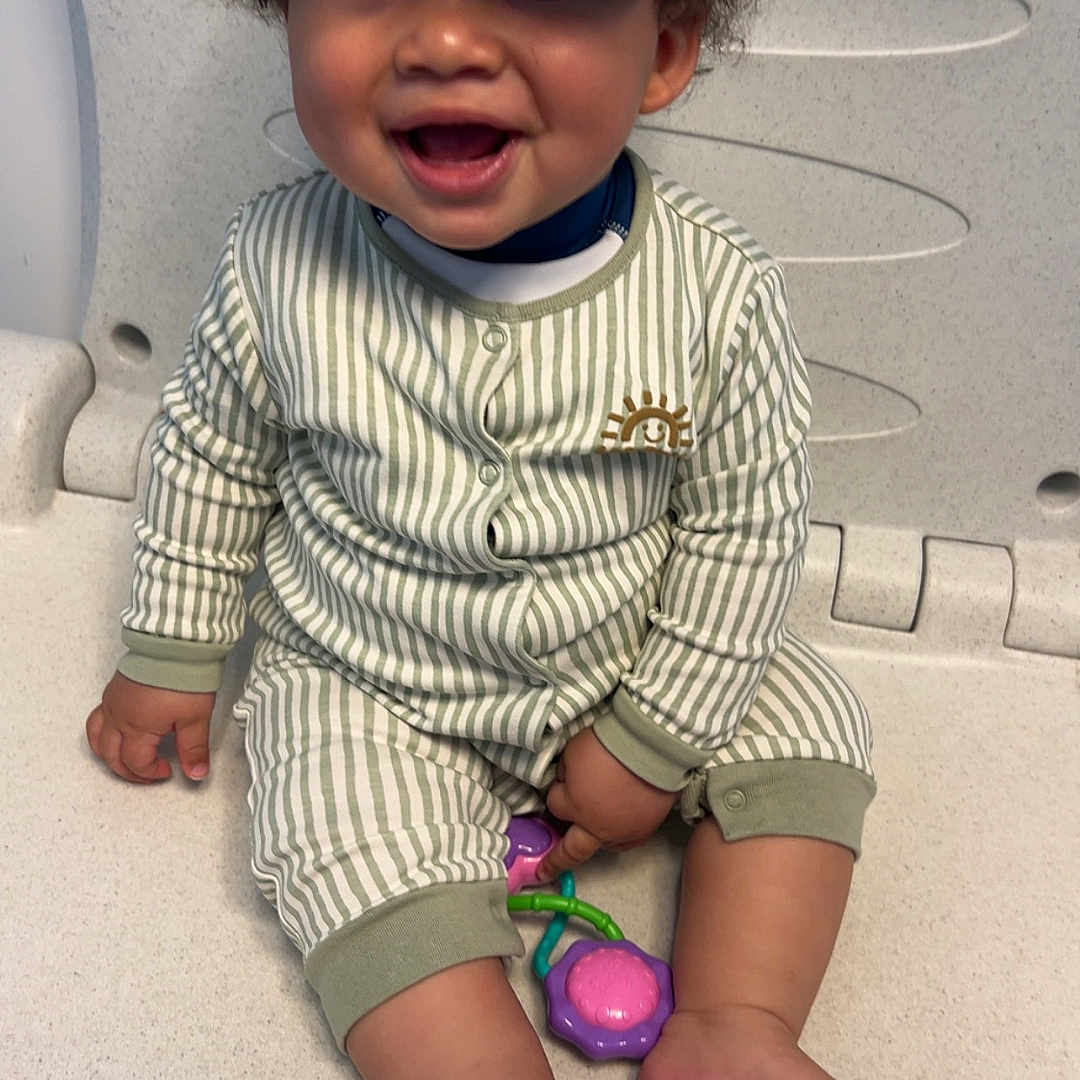 Remmy joined the competition — help win amazing prizes! accessories, baby, baseballcap, bathing, bodypart, cap, clothing, face, finger, hand, happy, hat, head, laughing, person, photography, portrait, shorts, sitting, smile