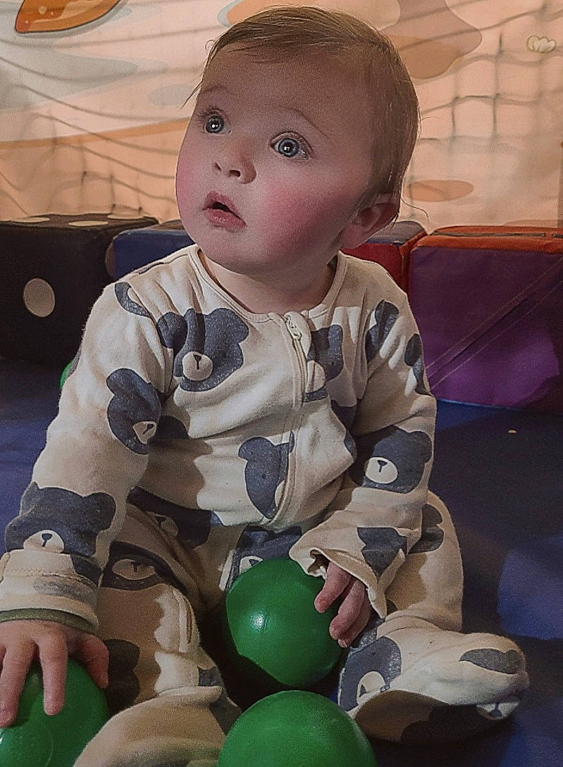 Oakley joined the competition — help win amazing prizes! baby, baby_toddler_clothing, ball, cheek, child, comfort, event, flooring, fun, happy, head, human_body, person, play, room, sitting, skin, sleeve, surprise, t_shirt