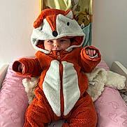 Cataleya participe au concours pour gagner de l'argent avec cette photo : baby, blanket, child, costume, cozy, cushion, cute, fox, hearts, hood, indoors, orange, pink, plush, portrait, smile, soft, stuffed_animal, warm, white