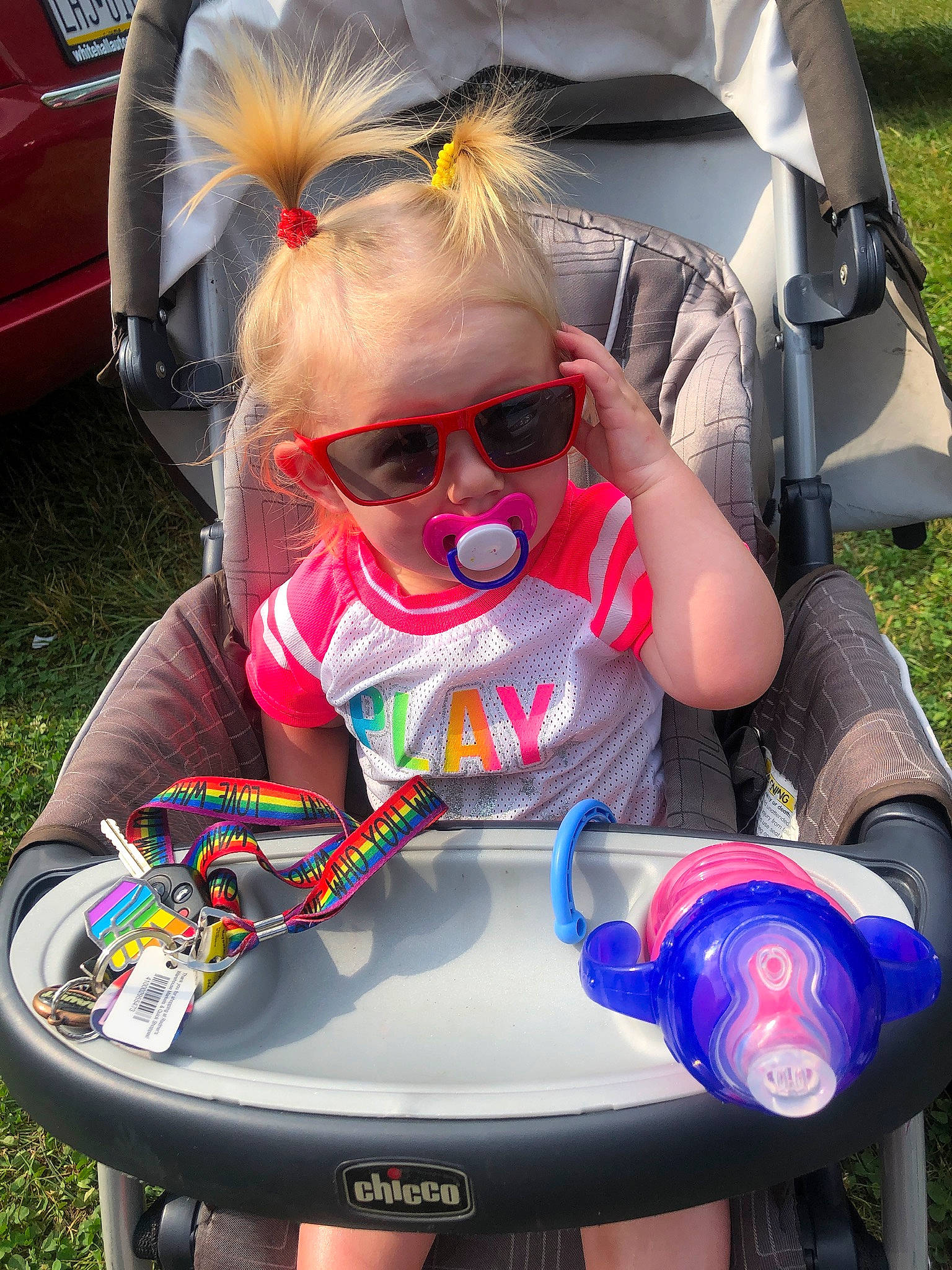 Jazmine is registered to the contest to win money with this photo: automotive_tail_brake_light, baby, baby_carriage, baby_products, baby_toddler_clothing, cool, eyewear, full_size_car, goggles, person, personal_protective_equipment, plastic, sunglasses, vehicle_door, vision_care