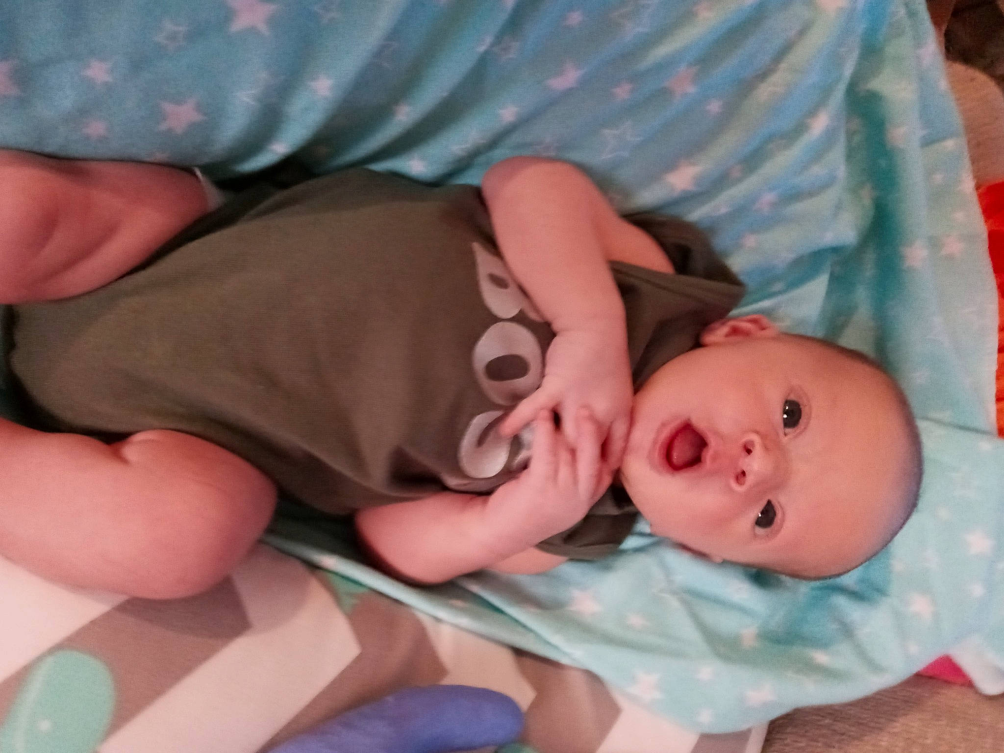 Axel joined the competition — help win amazing prizes! baby, baby_products, baby_sleeping, baby_toddler_clothing, cheek, comfort, eye, face, finger, head, human_body, linens, mouth, nail, nose, person, pink, skin, surprise, textile