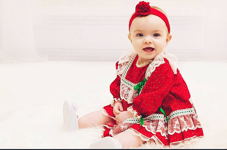 Korra joined the competition — help win amazing prizes! baby, baby_toddler_clothing, carmine, collar, costume, costume_hat, embellishment, event, face, fashion_accessory, fashion_design, fictional_character, happy, hat, headwear, magenta, pattern, person, sleeve, smile