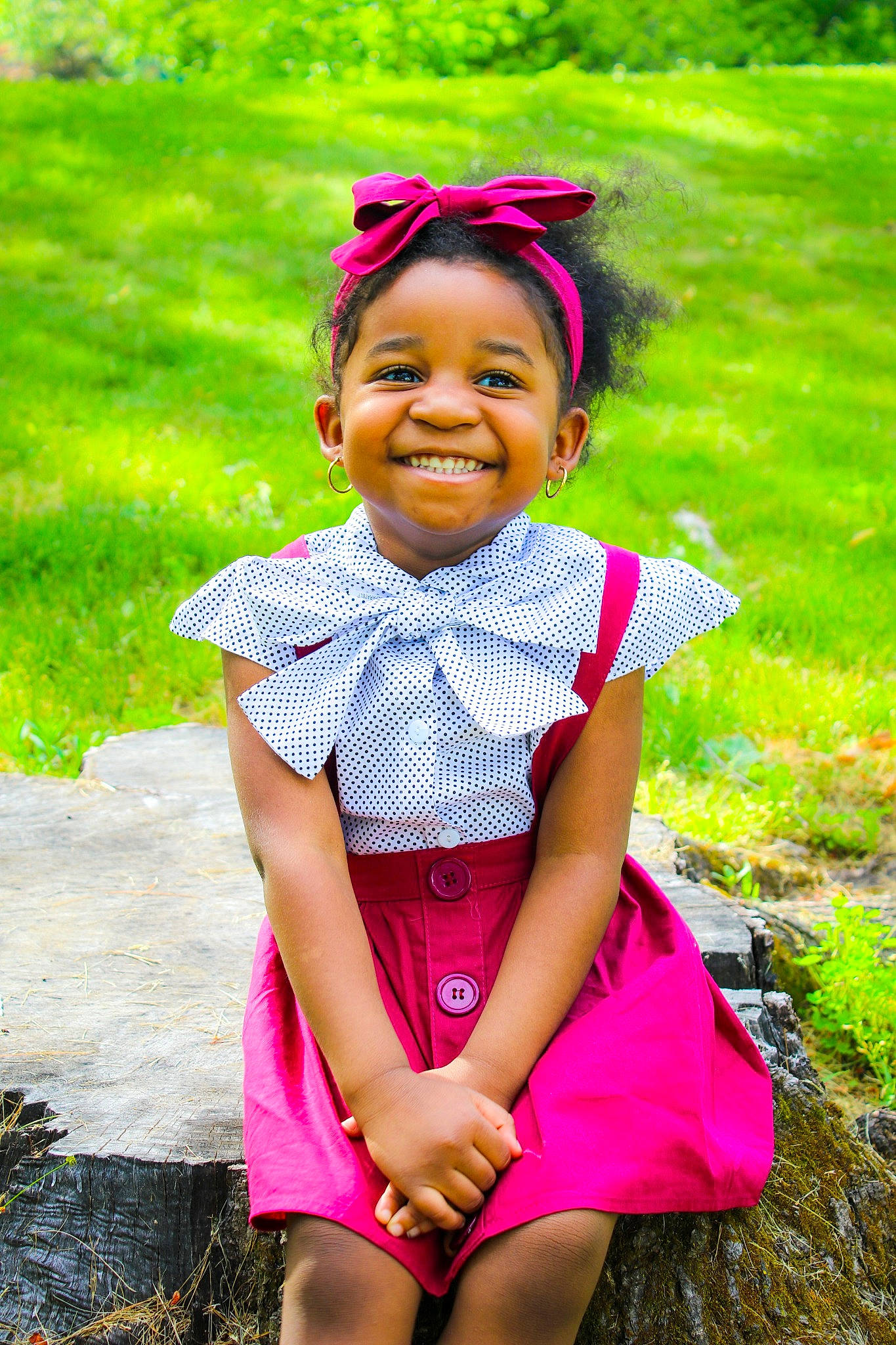 Laylani joined the competition — help win amazing prizes! baby_toddler_clothing, dress, eye, face, grass, green, happy, head, headgear, joy, leisure, magenta, people_in_nature, person, pink, plant, purple, red, skin, smile