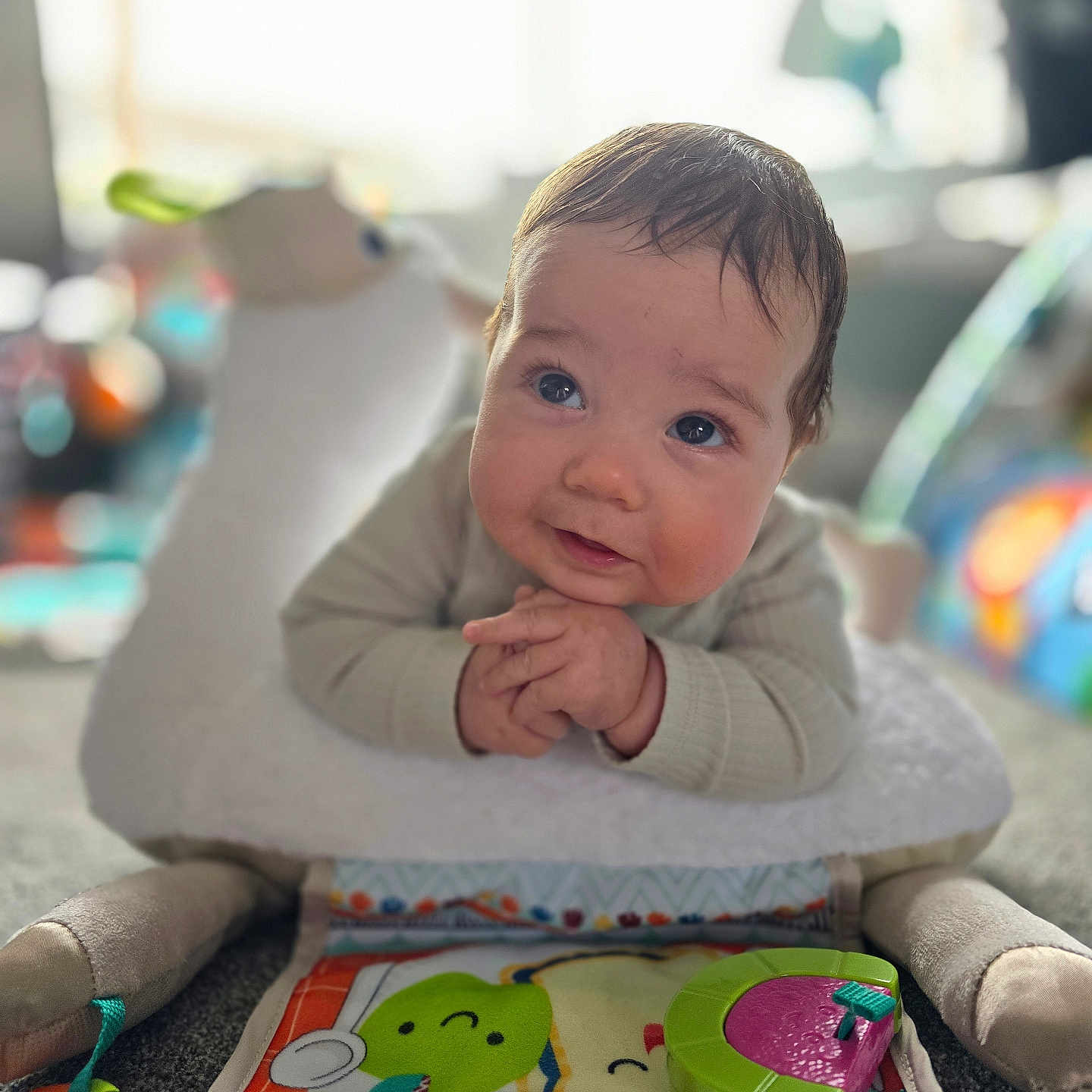 Caleb is registered to the contest to win money with this photo: baby, bodypart, couch, cream, cutlery, dessert, face, finger, food, furniture, hand, happy, head, icing, person, photography, portrait, sitting, smile, toy