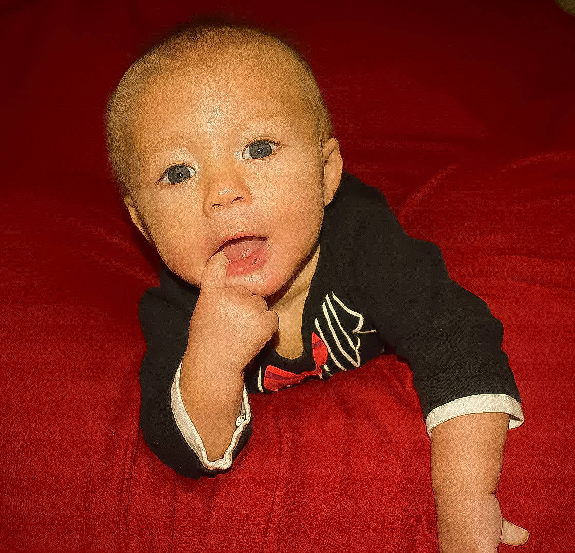 Kori joined the competition — help win amazing prizes! arm, baby, cheek, child, chin, eye, face, finger, gesture, hand, head, iris, lip, mouth, nose, person, portrait_photography, red, skin, thumb