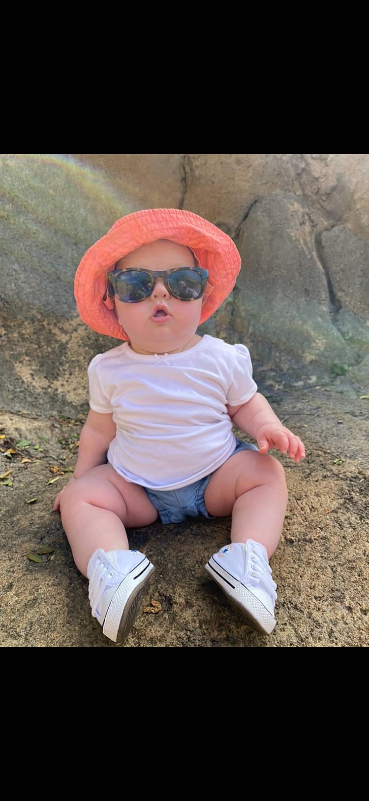 Brexley is registered to the contest to win money with this photo: baby_toddler_clothing, cap, cool, eyewear, footwear, fun, glasses, goggles, happy, hat, headwear, people_in_nature, person, pink, shoe, shorts, skin, sleeve, sunglasses, t_shirt