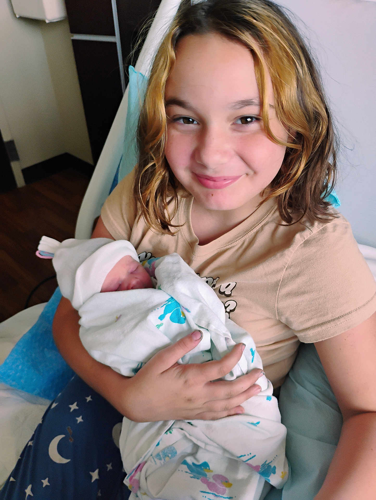 Alleah is registered to the contest to win money with this photo: child, newborn, baby, hospital, blanket, bed, pillow, smile, girl, person, indoor, holding, family, love, clothing, face, happy, human, caring, toddler