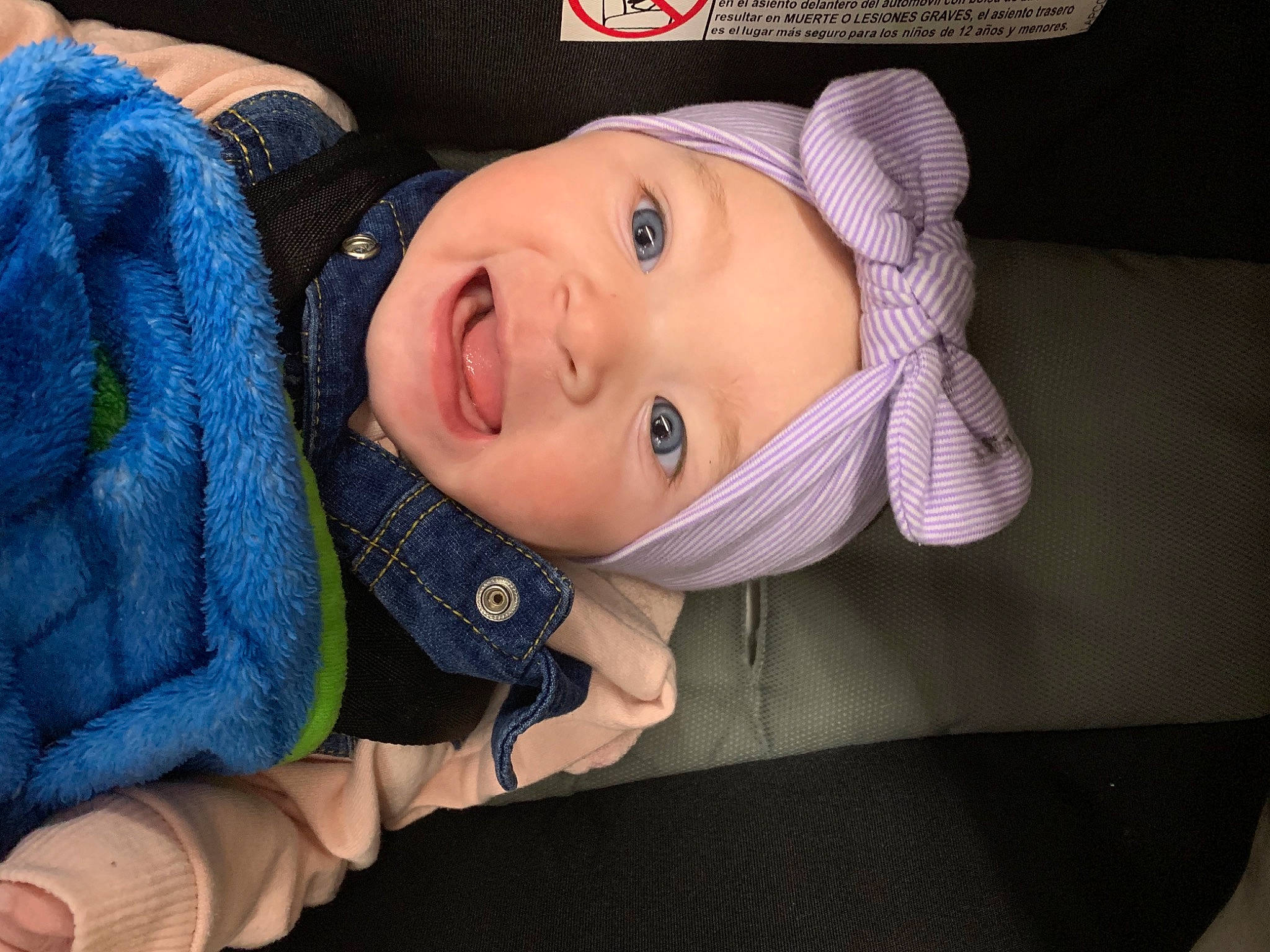 Astrid is registered to the contest to win money with this photo: baby, baby_products, baby_toddler_clothing, cap, cheek, child, comfort, electric_blue, flash_photography, fun, grass, happy, hat, headwear, iris, lip, nose, person, skin, smile