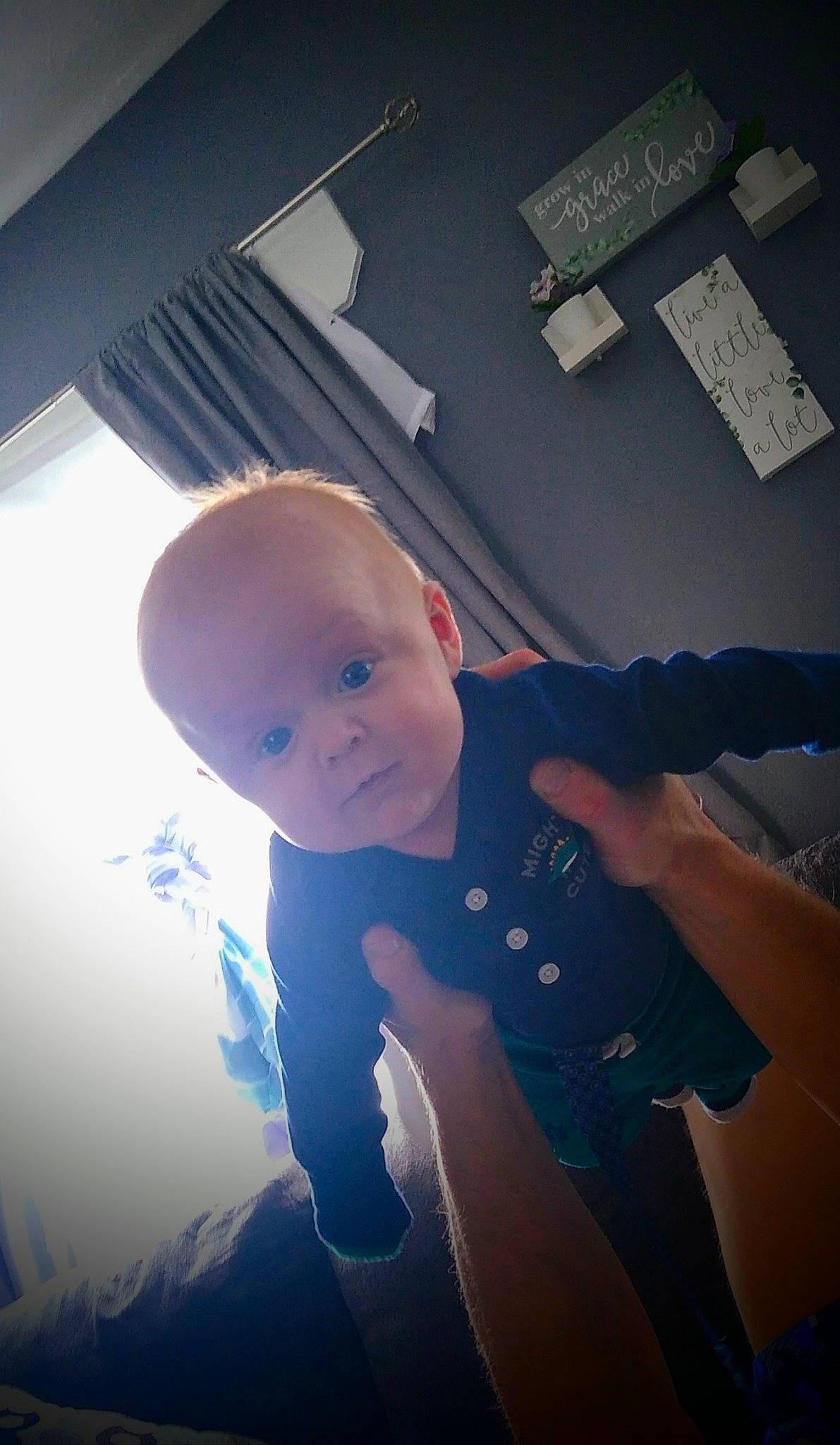 Shadow is registered to the contest to win money with this photo: baby, cloud, cool, elbow, electric_blue, finger, flash_photography, flooring, fun, gesture, hand, happy, meteorological_phenomenon, person, sitting, sky, space, t_shirt, thumb, tints_and_shades