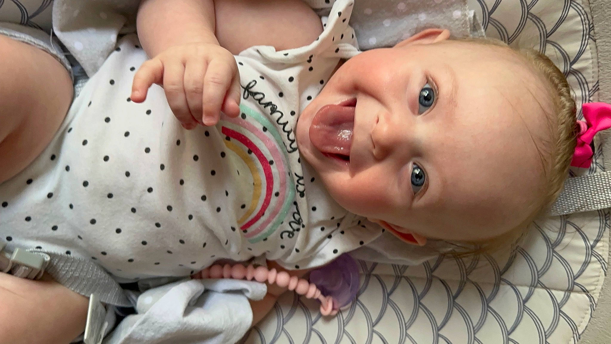 Ember is registered to the contest to win money with this photo: baby, baby_products, baby_toddler_clothing, cheek, child, eyelash, facial_expression, finger, fun, happy, iris, lip, mouth, nail, nose, person, skin, sleeve, smile, thumb