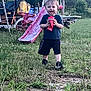 Wesson joined the competition — help win amazing prizes! toddler, child, grass, outdoor, playground, slide, toy, cup, smiling, shorts, tshirt, shoes, nature, trees, summer, daylight, happy, playing, young_child, recreation