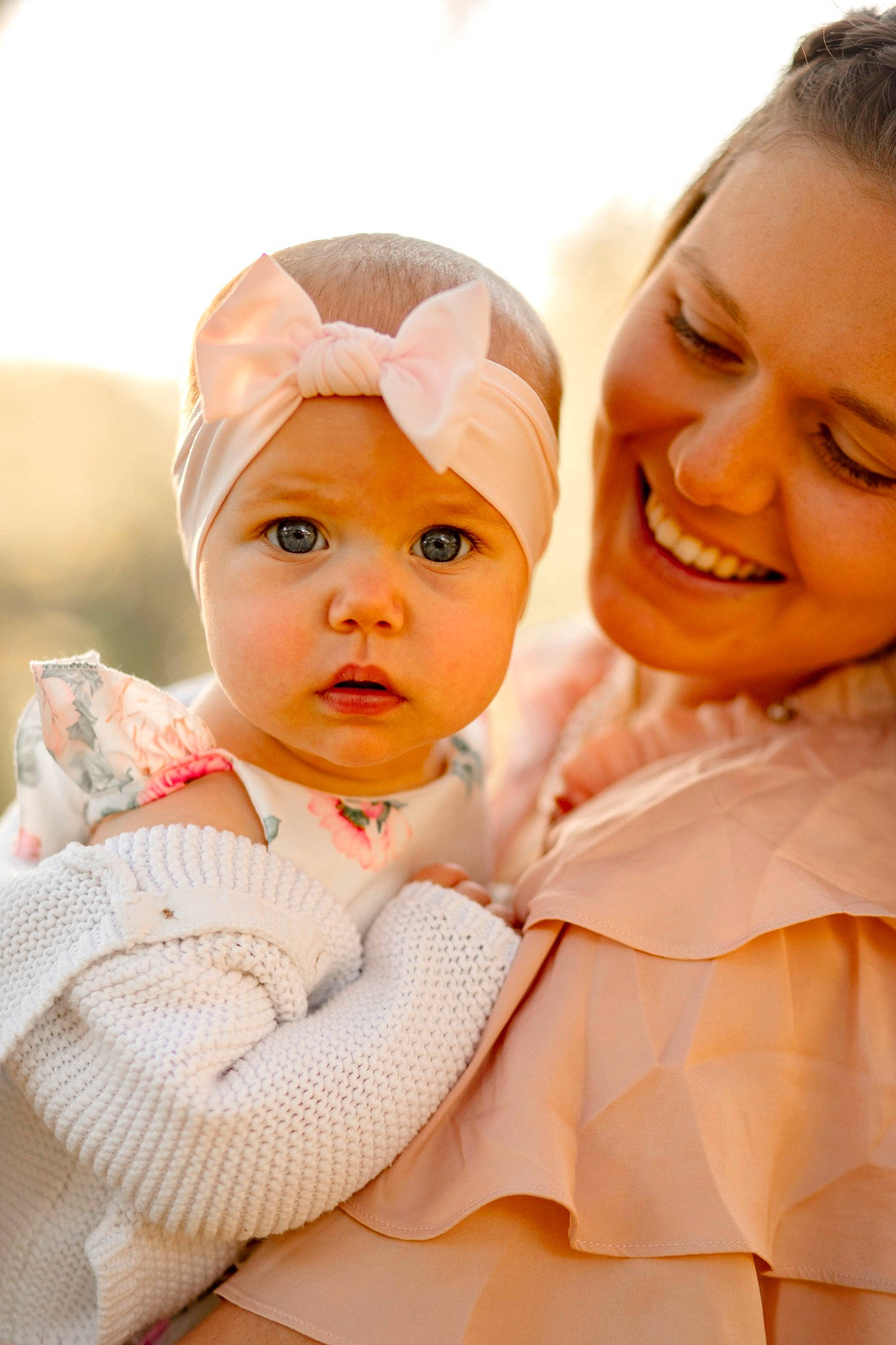 Sloane is registered to the contest to win money with this photo: baby, baby_products, baby_toddler_clothing, cheek, child, comfort, event, facial_expression, fun, gesture, happy, headwear, joy, lip, nose, orange, peach, person, pink, skin