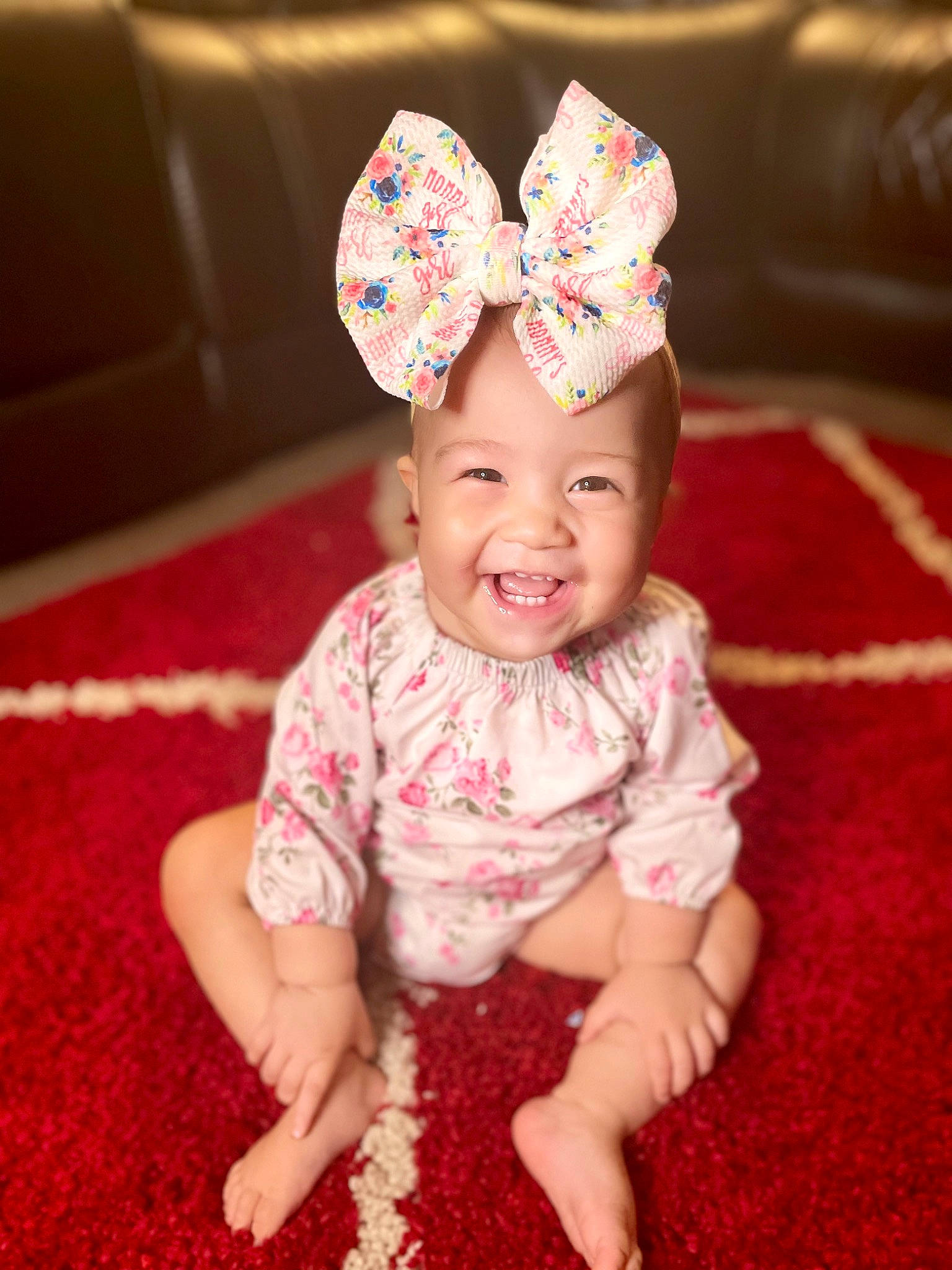 Aliana joined the competition — help win amazing prizes! baby, baby_toddler_clothing, cap, costume_hat, face, finger, flooring, happy, head, headband, headgear, headwear, human_body, magenta, pattern, person, pink, red, skin, sleeve