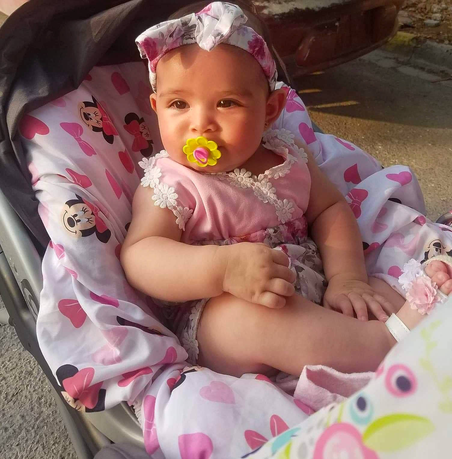 Yudith joined the competition — help win amazing prizes! baby, baby_products, baby_toddler_clothing, cheek, child, comfort, eye, fashion_accessory, fun, grass, happy, headwear, iris, lap, person, pink, product, recreation, sharing, sitting