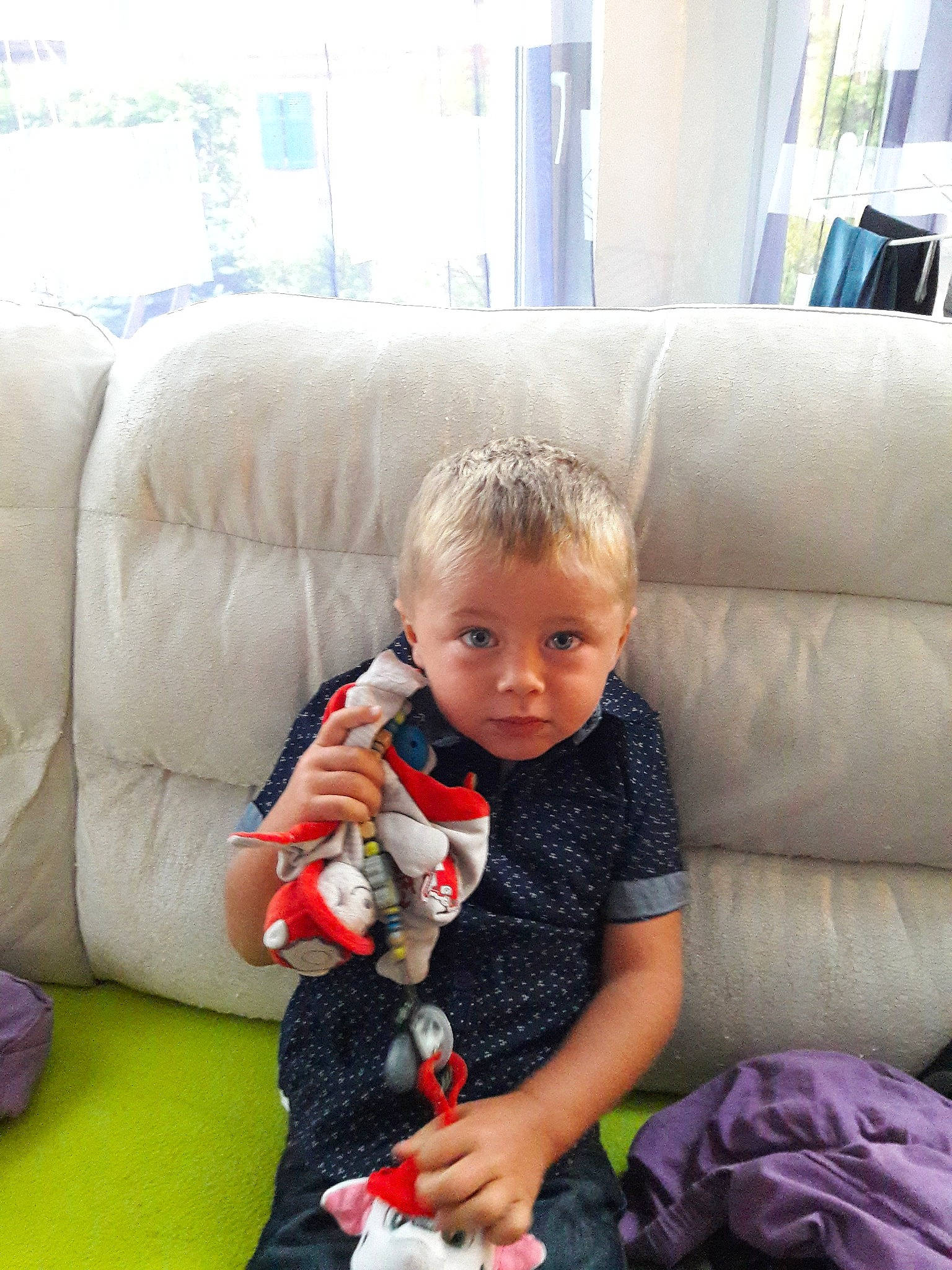 Enoha participe au concours pour gagner de l'argent avec cette photo : baby_products, child, day, fun, girl, infant, person, play, product, sitting, skin, smile, textile, toddler