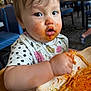 toddler, child, messy, spaghetti, food, bib, high_chair, restaurant, indoor, face, hand, clothing, table, plate, sauce, eating, person, hair, expression, seat