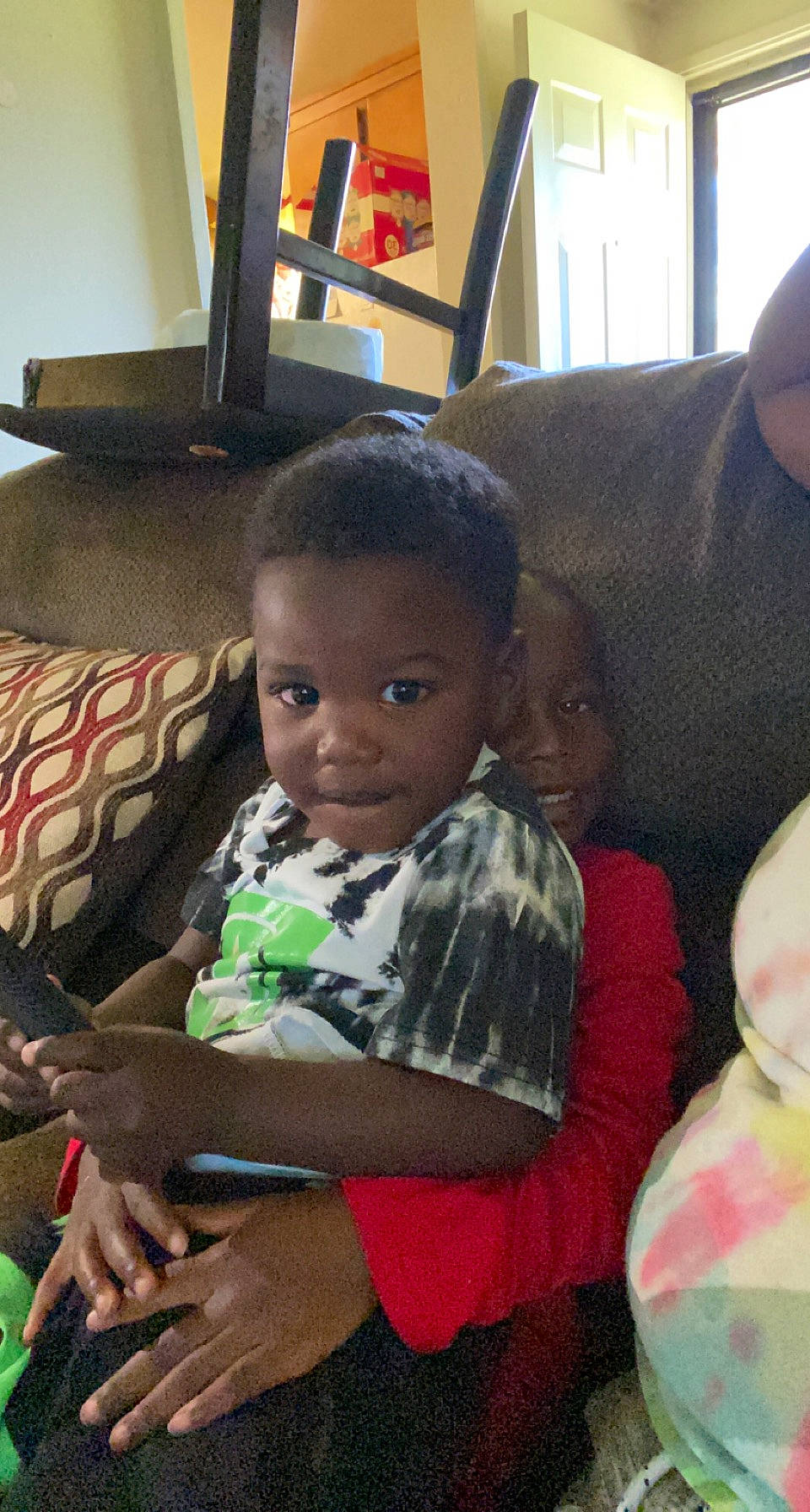 Kyan joined the competition — help win amazing prizes! child, comfort, couch, electronic_device, event, finger, fun, hair, hairstyle, happy, lap, living_room, person, room, sharing, sitting, skin, smile, t_shirt, technology