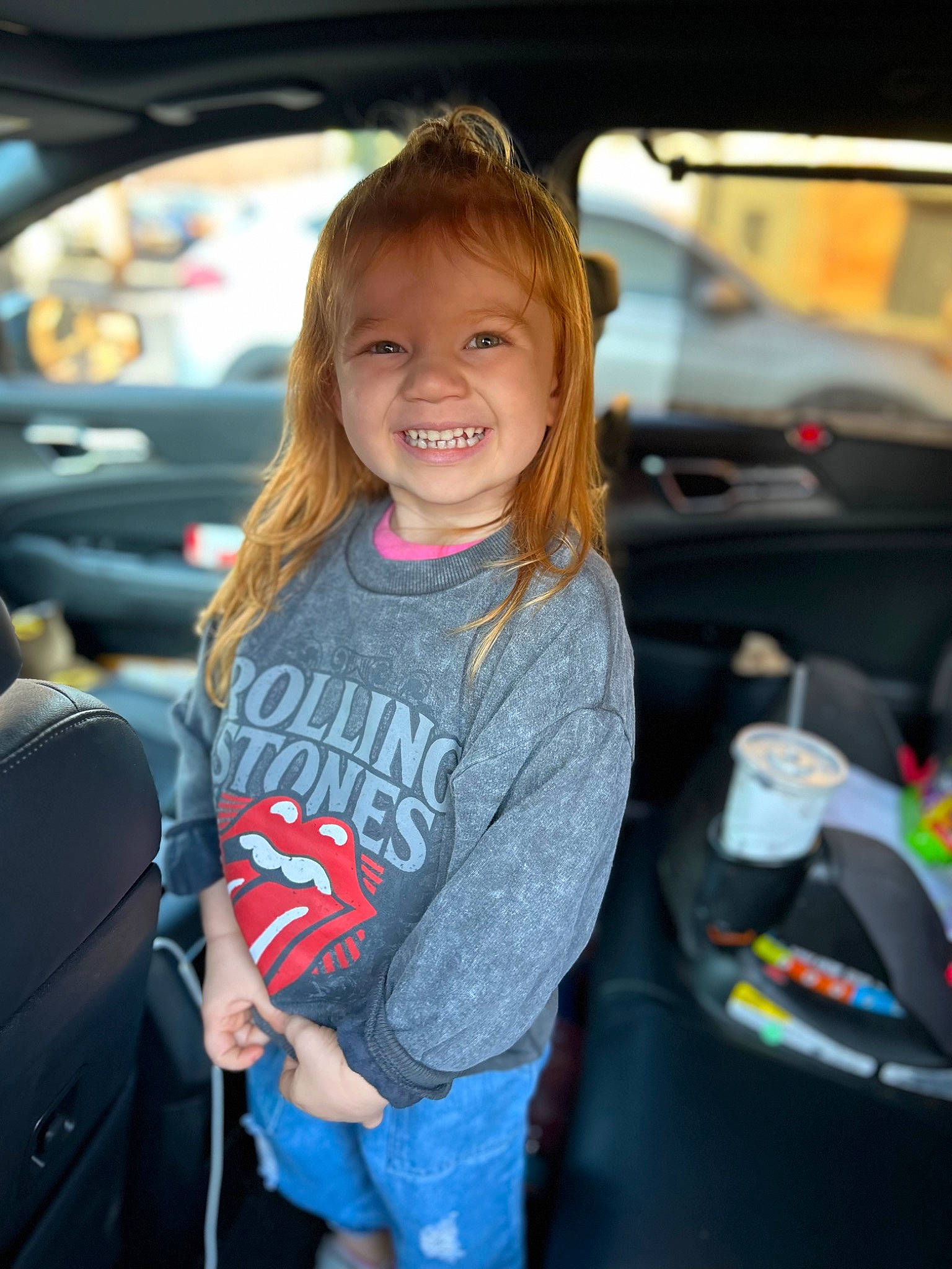 Peyton joined the competition — help win amazing prizes! auto_part, automotive_design, automotive_exterior, automotive_lighting, automotive_tire, automotive_wheel_system, bumper, car, electric_blue, family_car, fun, hood, joy, motor_vehicle, person, personal_luxury_car, smile, steering_wheel, toddler, vehicle