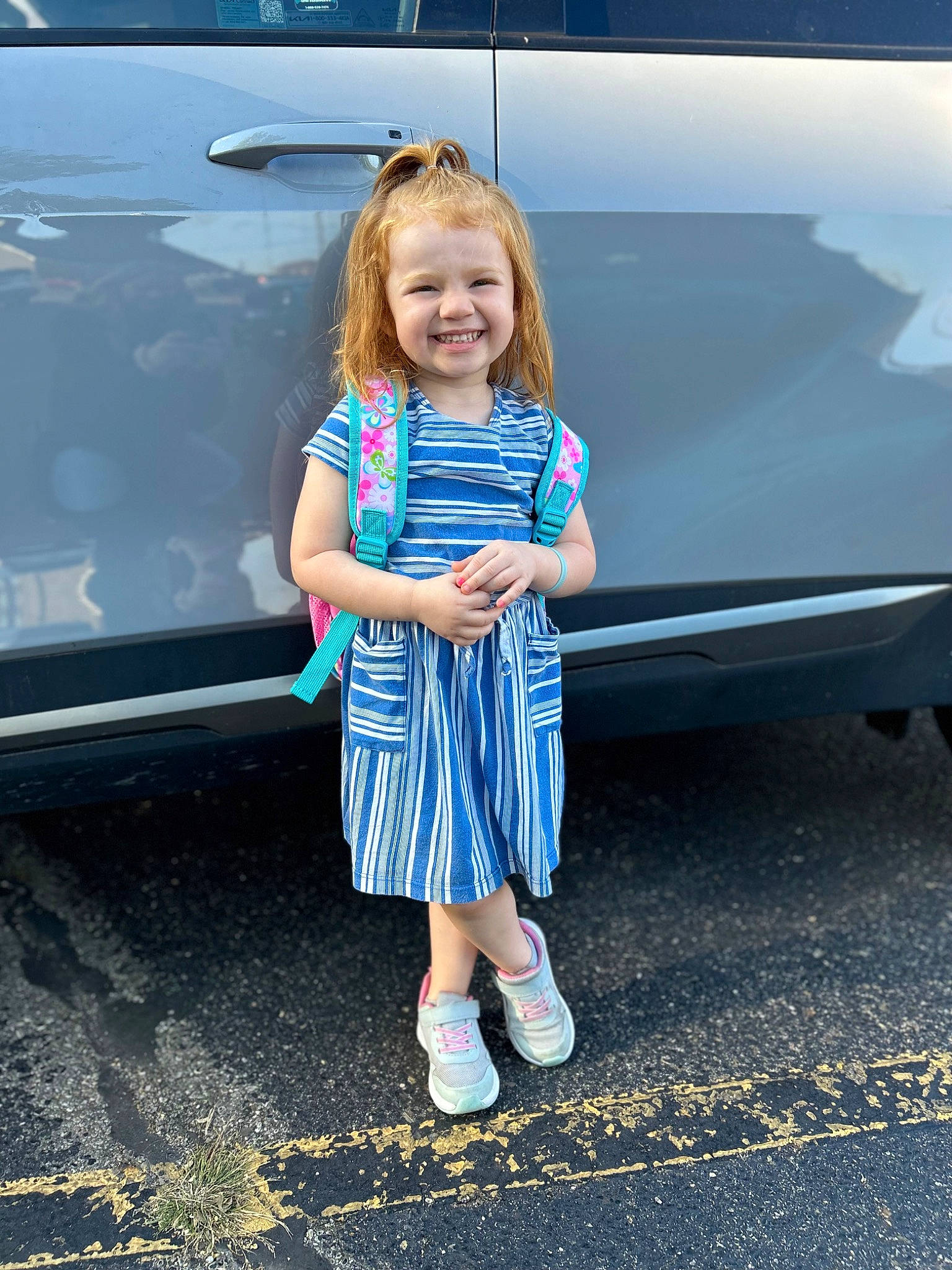 Peyton joined the competition — help win amazing prizes! asphalt, auto_part, automotive_design, automotive_exterior, automotive_lighting, automotive_tire, automotive_wheel_system, bumper, car, dress, electric_blue, family_car, fun, hood, joy, motor_vehicle, person, smile, tints_and_shades, toddler