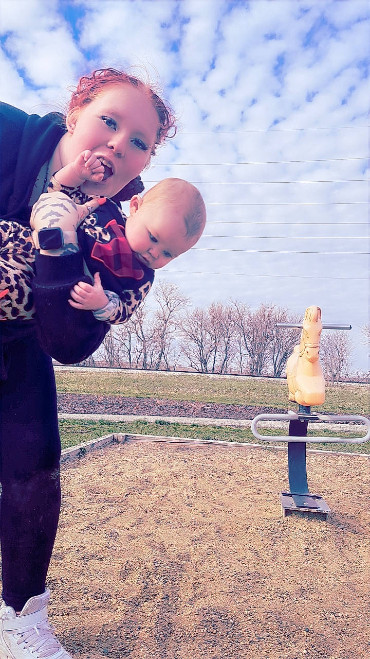 Nova Ann is registered to the contest to win money with this photo: baby, child, cloud, flash_photography, fun, gesture, grass, grassland, happy, landscape, leisure, people_in_nature, person, play, playing_with_kids, recreation, sky, soil, sunlight, toddler