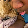 dog, person, close_up, face, nose, lips, eyelashes, blanket, bed, cuddle, pet, fur, indoor, skin, comfort, affection, sleepy, rest, cozy, intimate