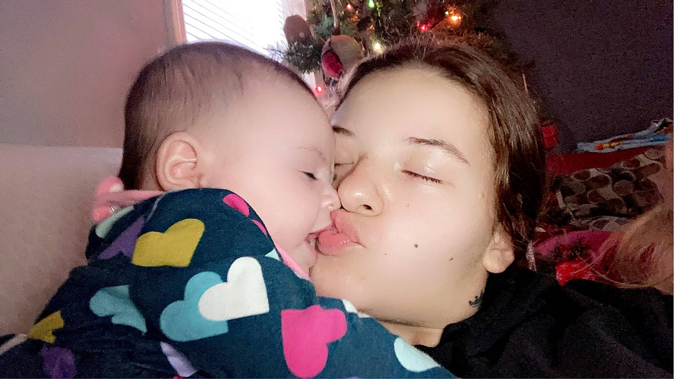 Scarlett joined the competition — help win amazing prizes! baby, baby_toddler_clothing, cheek, child, christmas_ornament, christmas_tree, curtain, ear, event, fun, gesture, happy, holiday, iris, kiss, nose, ornament, pattern, person, skin