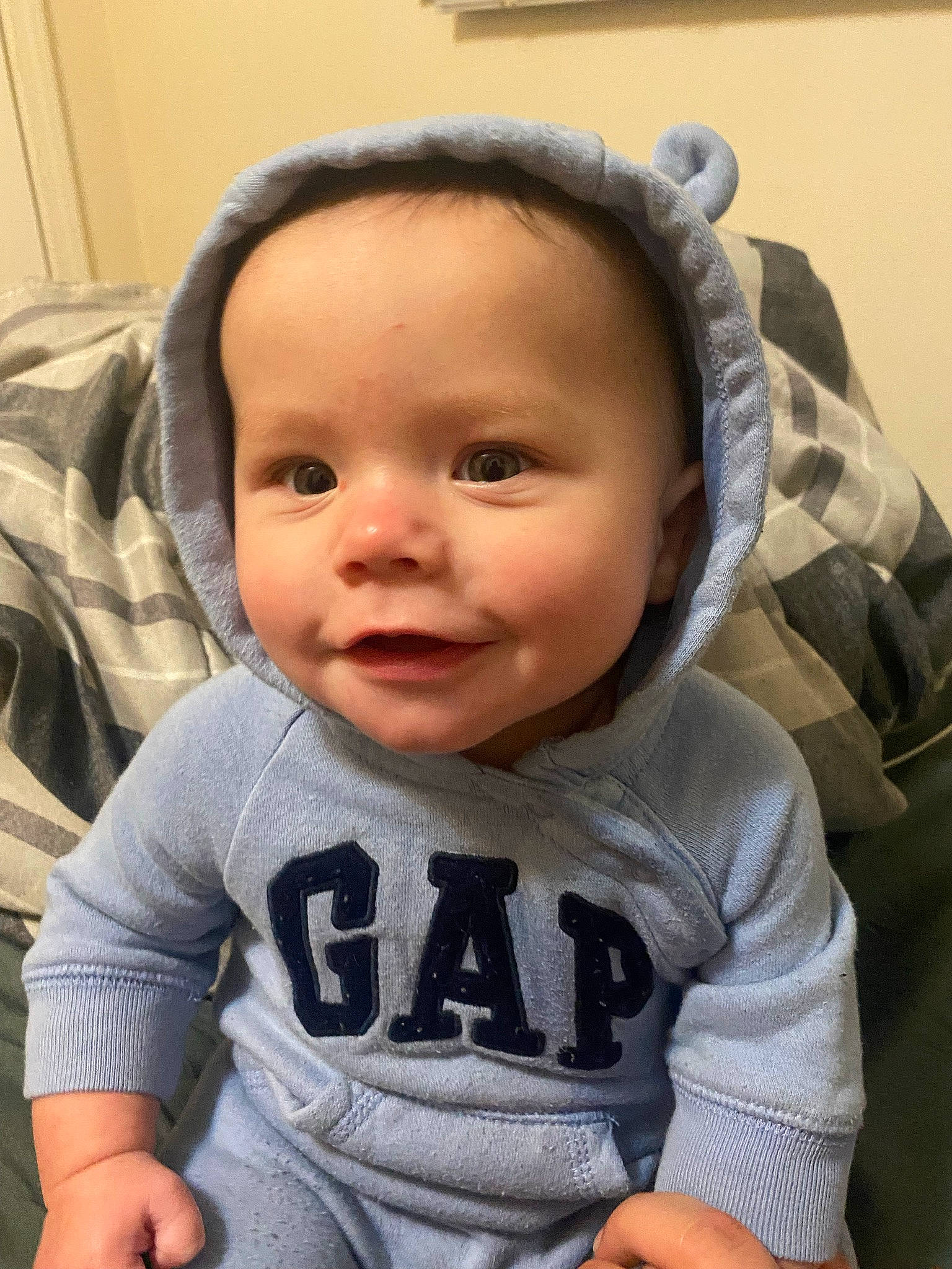 Ledger is registered to the contest to win money with this photo: baby, baby_toddler_clothing, cheek, chin, cool, ear, eyebrow, eyelash, forehead, happy, head, iris, lip, mammal, mouth, neck, nose, person, skin, sleeve