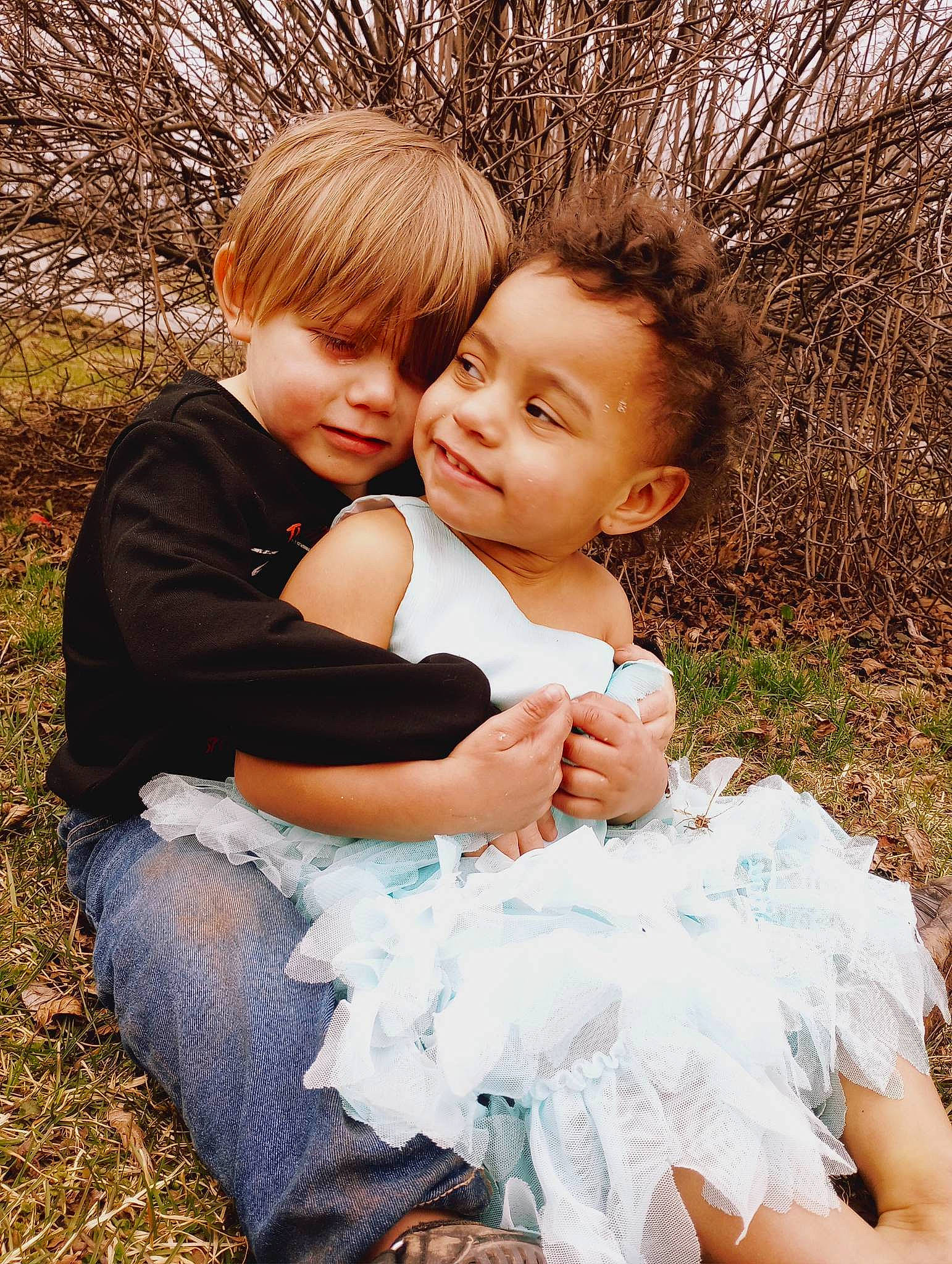 Anavaeh Miller is registered to the contest to win money with this photo: baby, baby_toddler_clothing, child, face, flash_photography, formal_wear, fun, grass, grassland, hairstyle, happy, headpiece, iris, people_in_nature, person, plant, ruffle, sitting, smile, toddler