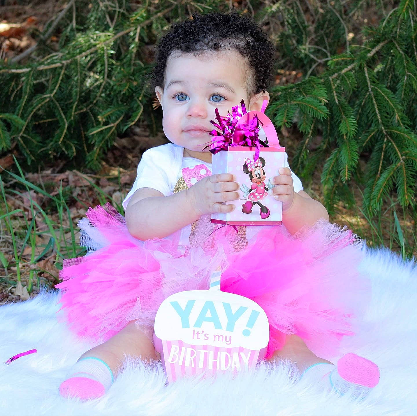 Jazlyn is registered to the contest to win money with this photo: baby, baby_products, baby_toddler_clothing, ballet_tutu, child, costume, font, fun, fur, grass, happy, magenta, mythical_creature, people_in_nature, person, pink, plant, ruffle, sitting, toddler