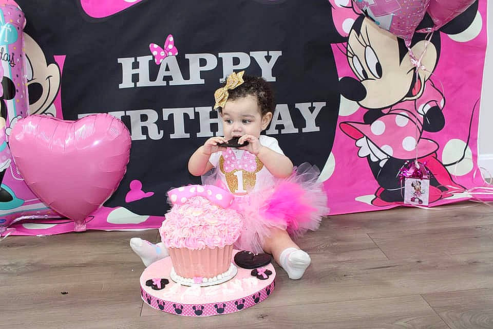 Jazlyn is registered to the contest to win money with this photo: baking_cup, balloon, birthday, buttercream, cake, cake_decorating, cake_decorating_supply, cream, dessert, event, fun, happy, icing, magenta, party_supply, person, pink, sugar_cake, sweetness, toddler