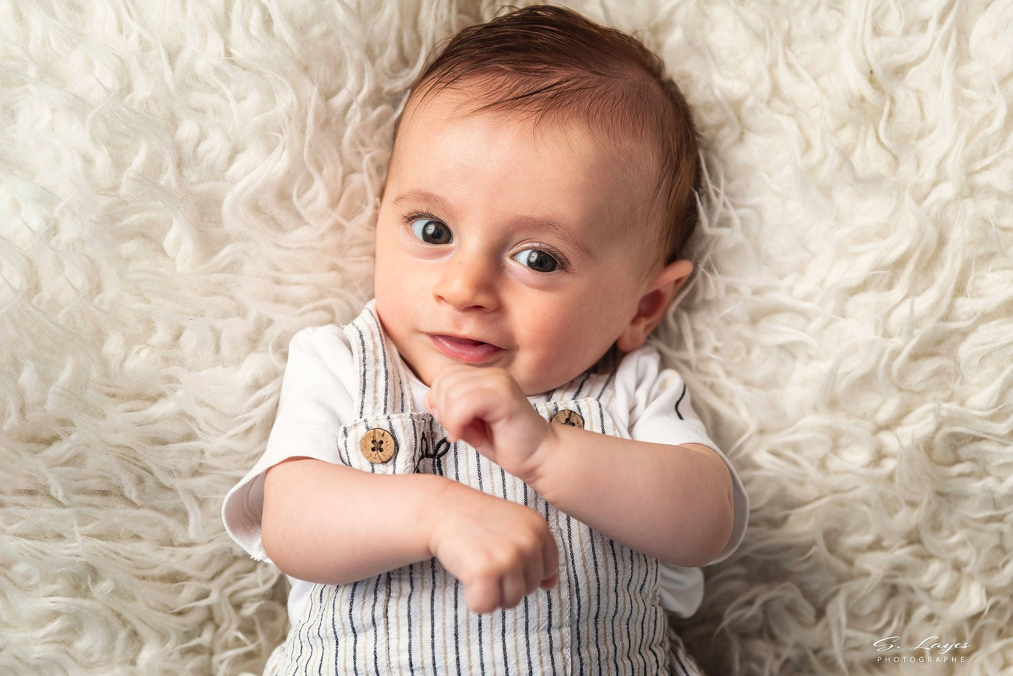 Thylian participe au concours pour gagner de l'argent avec cette photo : baby, cheek, child, child_model, ear, eye, face, head, iris, lip, nose, person, photo_shoot, photograph, photography, portrait, portrait_photography, skin, smile, toddler