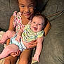 child, baby, smiling, happy, couch, indoor, family, holding, sitting, clothing, cute, infant, person, portrait, joy, toddler, young, candid, together, love