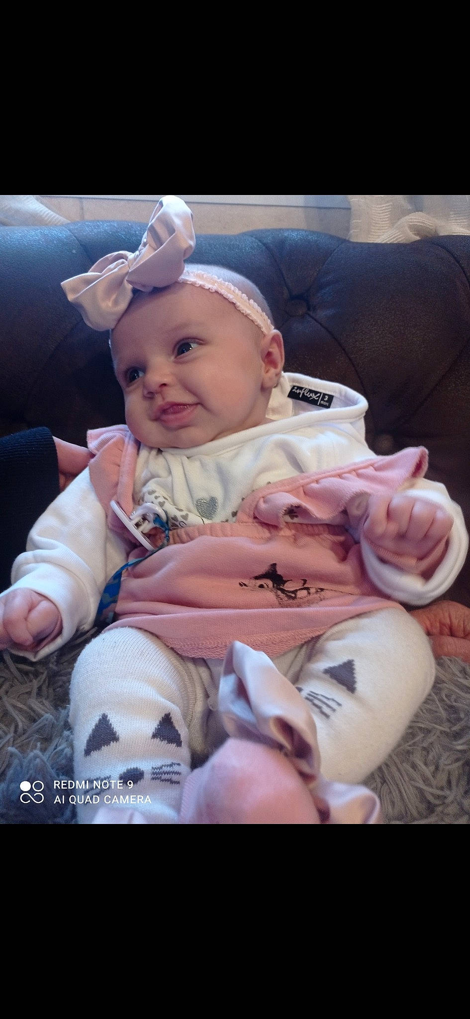 Kenly participe au concours pour gagner de l'argent avec cette photo : baby, baby_products, baby_toddler_clothing, cheek, child, comfort, eye, flash_photography, fun, grass, happy, hat, pattern, person, pink, portrait_photography, sitting, skin, sleeve, smile