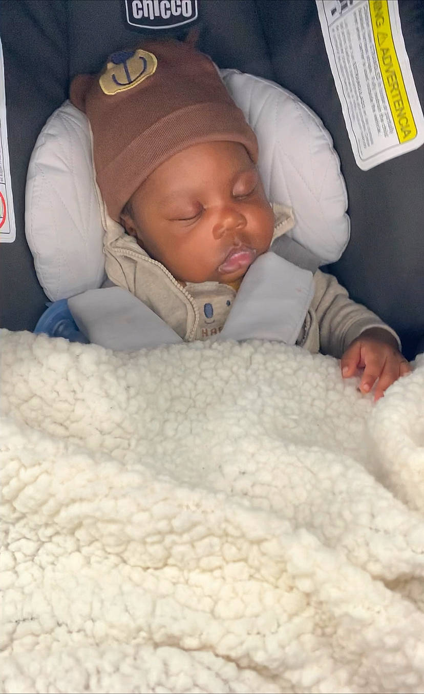 Rozhat W is registered to the contest to win money with this photo: baby, baby_sleeping, baby_toddler_clothing, bedding, bedtime, blanket, cap, cheek, child, comfort, fur, headwear, knit_cap, linens, mouth, nap, nose, person, skin, textile