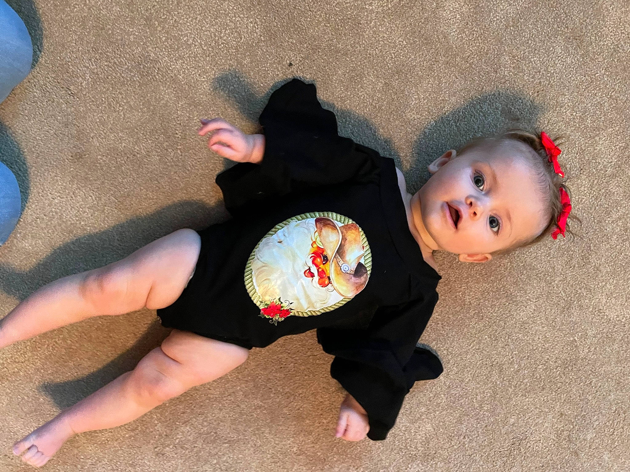 Bristol is registered to the contest to win money with this photo: baby, baby_toddler_clothing, barefoot, elbow, finger, flooring, foot, fun, gesture, human_body, human_leg, knee, leg, person, sleeve, thigh, toddler, toe, waist, wood