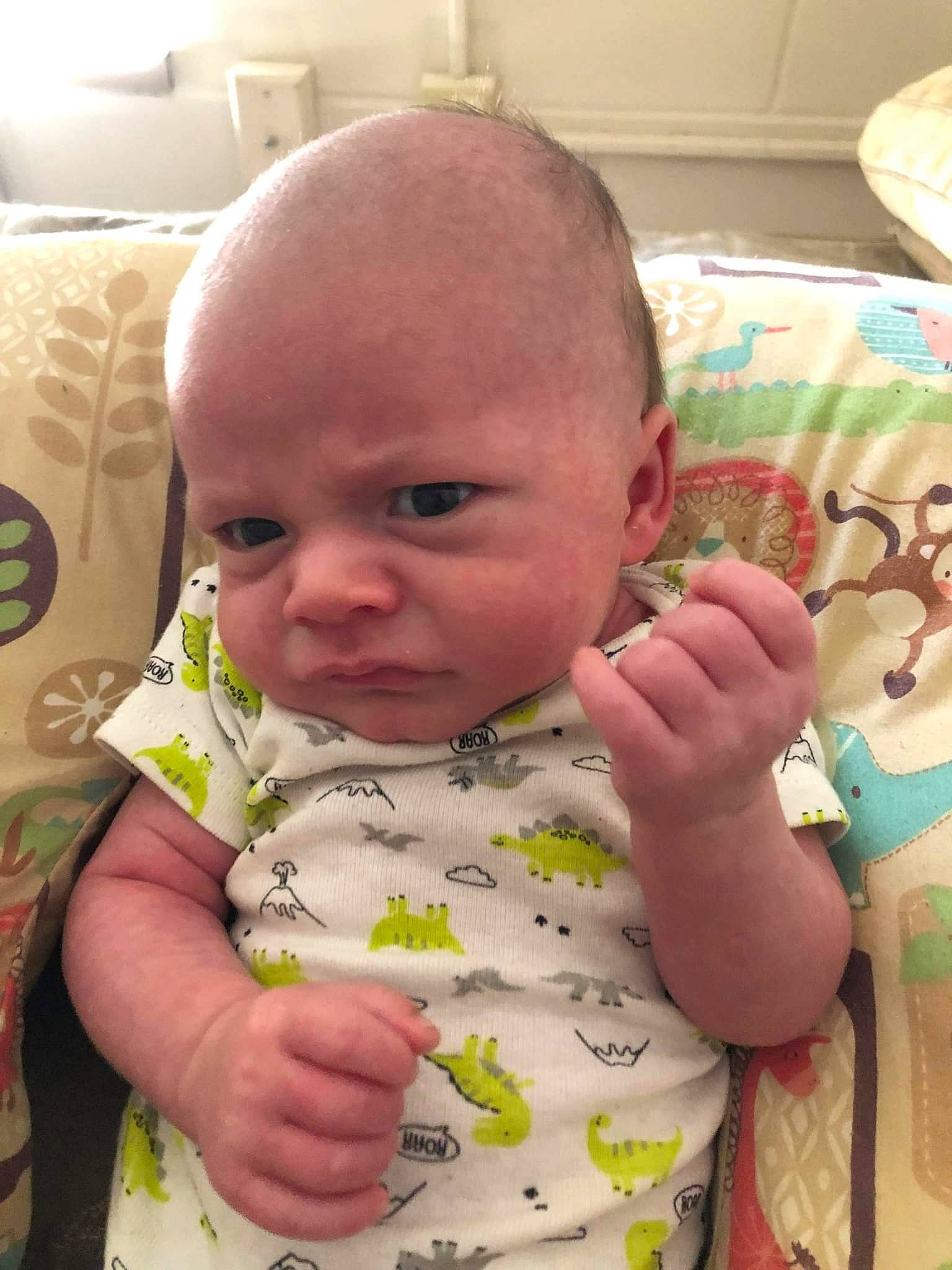 James joined the competition — help win amazing prizes! arm, baby, baby_toddler_clothing, cheek, chin, eye, eyebrow, face, forehead, gesture, green, head, human_body, iris, lip, mouth, neck, nose, organ, person