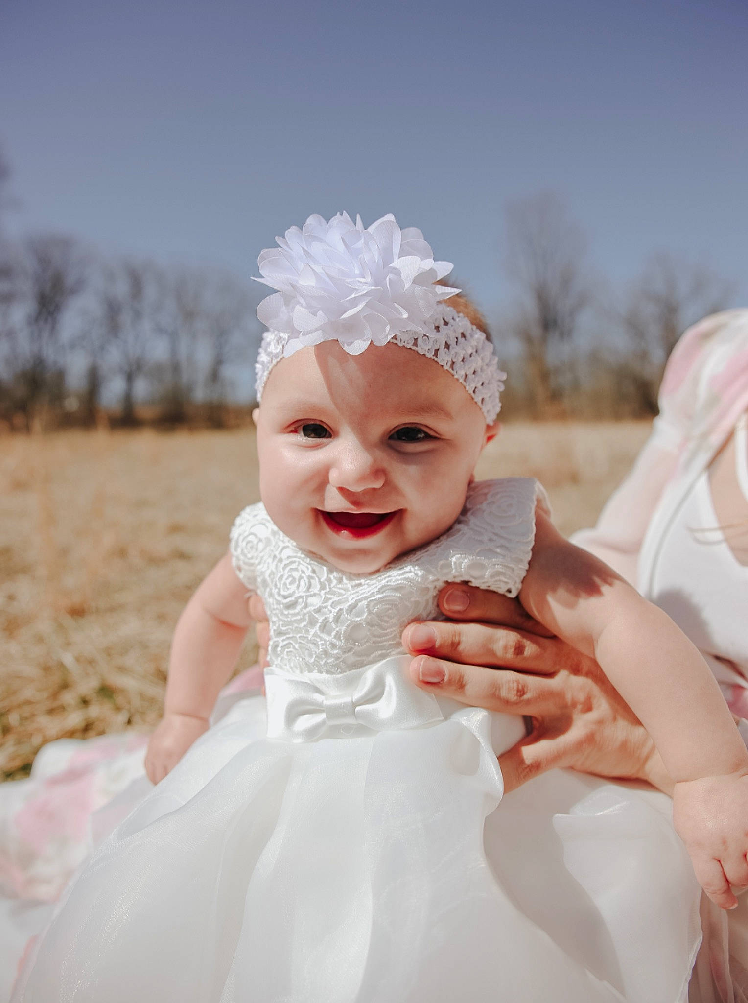 Camille joined the competition — help win amazing prizes! bridal_accessory, bridal_clothing, bridal_veil, dress, embellishment, flash_photography, fun, gesture, gown, hairstyle, happy, headgear, headpiece, headwear, person, pink, skin, sky, smile, toddler