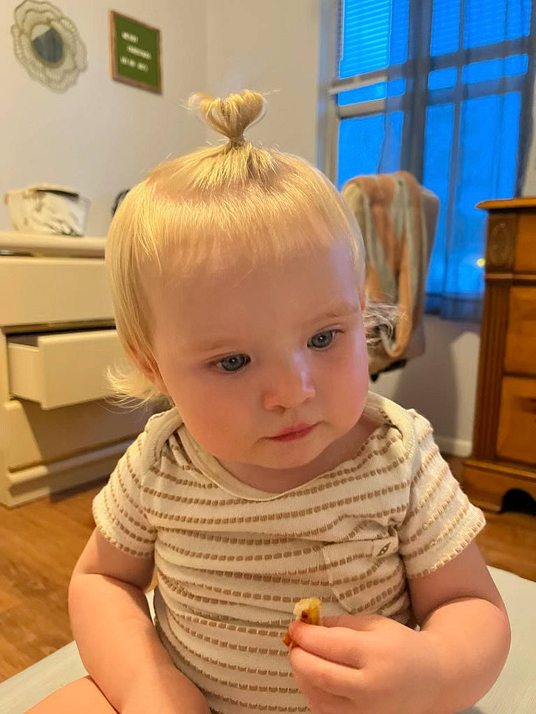 Mia-rose is registered to the contest to win money with this photo: baby, baby_toddler_clothing, bangs, blond, cabinetry, cheek, child, drawer, eyelash, flooring, fun, happy, hardwood, nose, person, sitting, standing, thumb, toddler, window