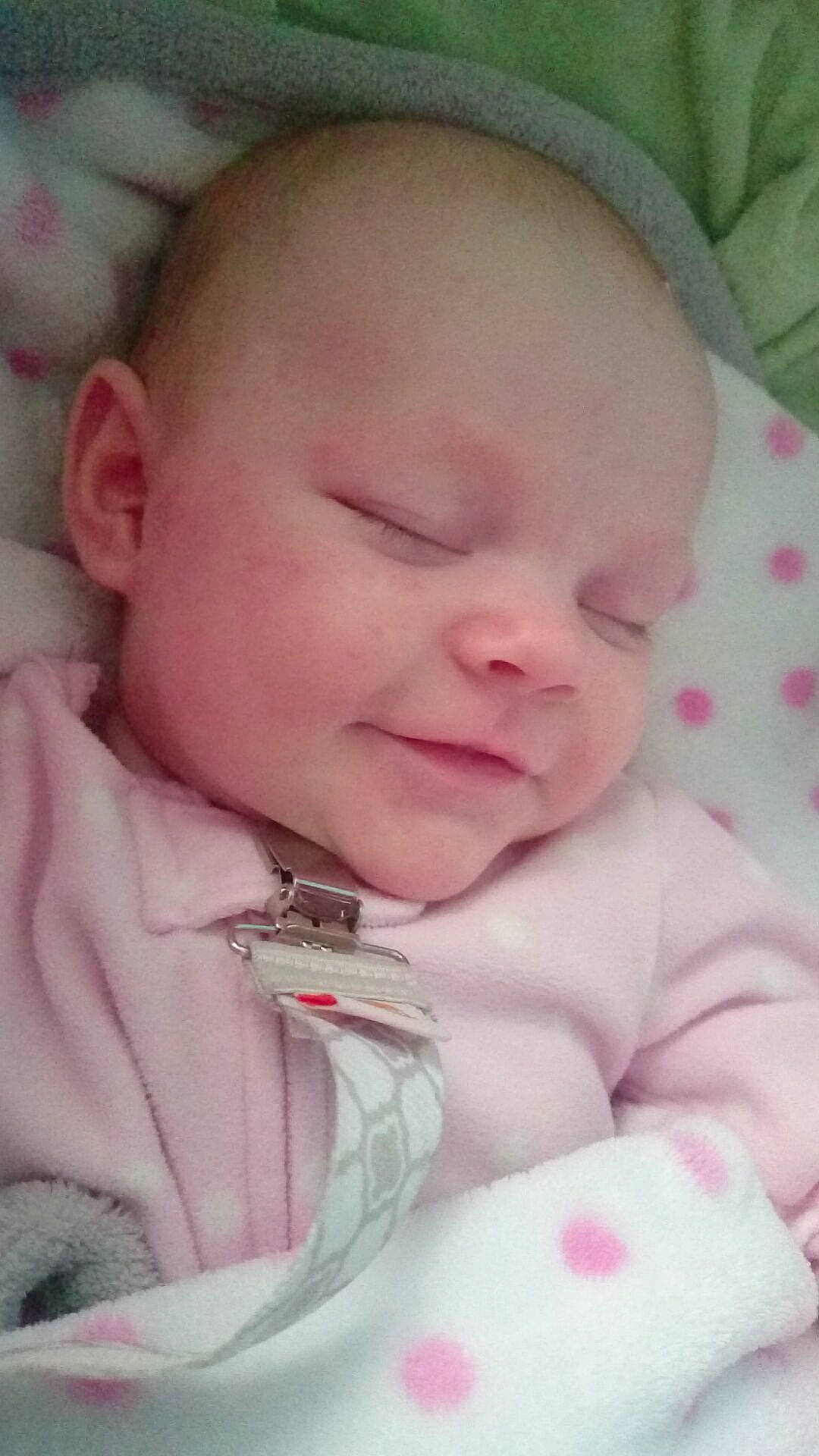 Hallie is registered to the contest to win money with this photo: bedtime, cheek, child, close_up, ear, face, head, infant, iris, lip, mouth, nap, nose, person, pink, product, skin, sleep, toddler