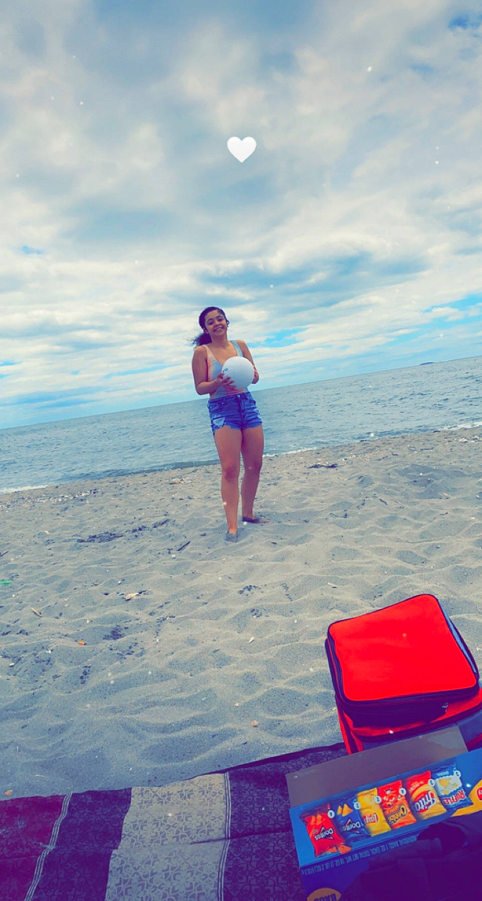 Mayalee is registered to the contest to win money with this photo: azure, beach, blue, cloud, electric_blue, fun, happy, hat, horizon, joy, landscape, leisure, outdoor_furniture, people_in_nature, people_on_beach, person, recreation, shorts, sky, sunglasses