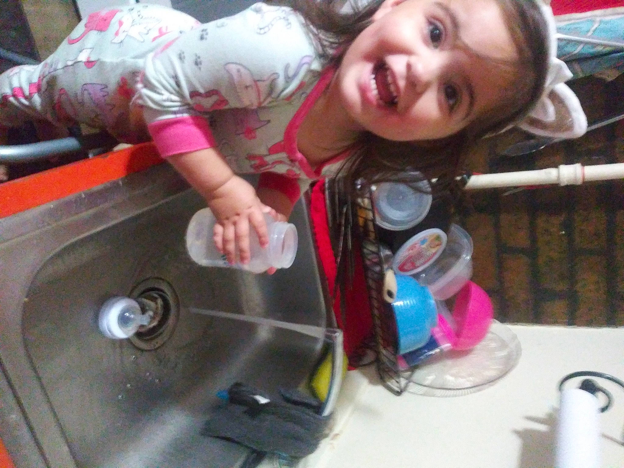 Colette is registered to the contest to win money with this photo: auto_part, automotive_exterior, automotive_lighting, automotive_tire, bumper, child, face, fun, gas, glass, happy, joy, kitchen_sink, leisure, person, personal_protective_equipment, recreation, sink, smile, tap