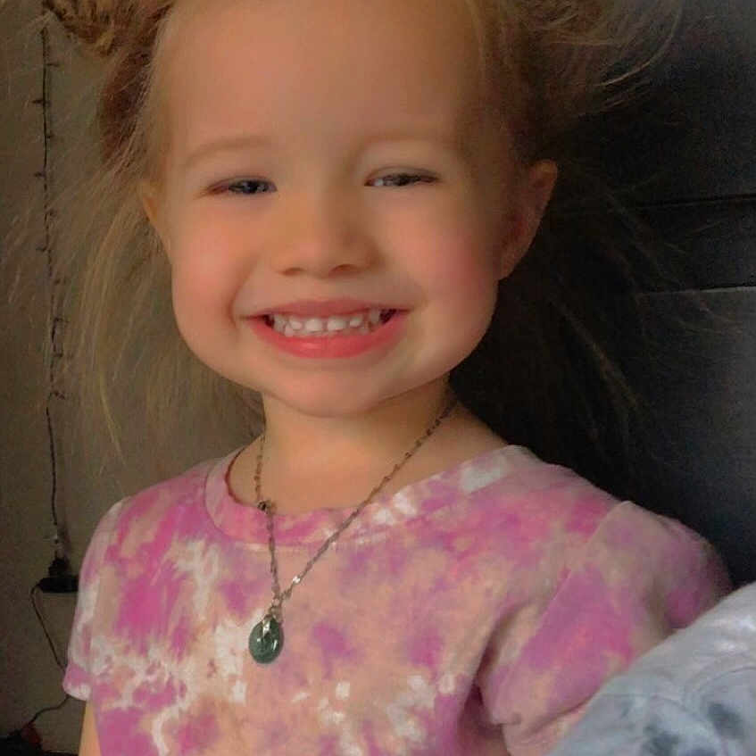 Kemiah Prengel joined the competition — help win amazing prizes! child, girl, smiling, happy, indoor, portrait, tie_dye_shirt, necklace, hair_buns, cute, young, person, fashion, casual_clothing, childhood, cheerful, playful, standing, face, hair
